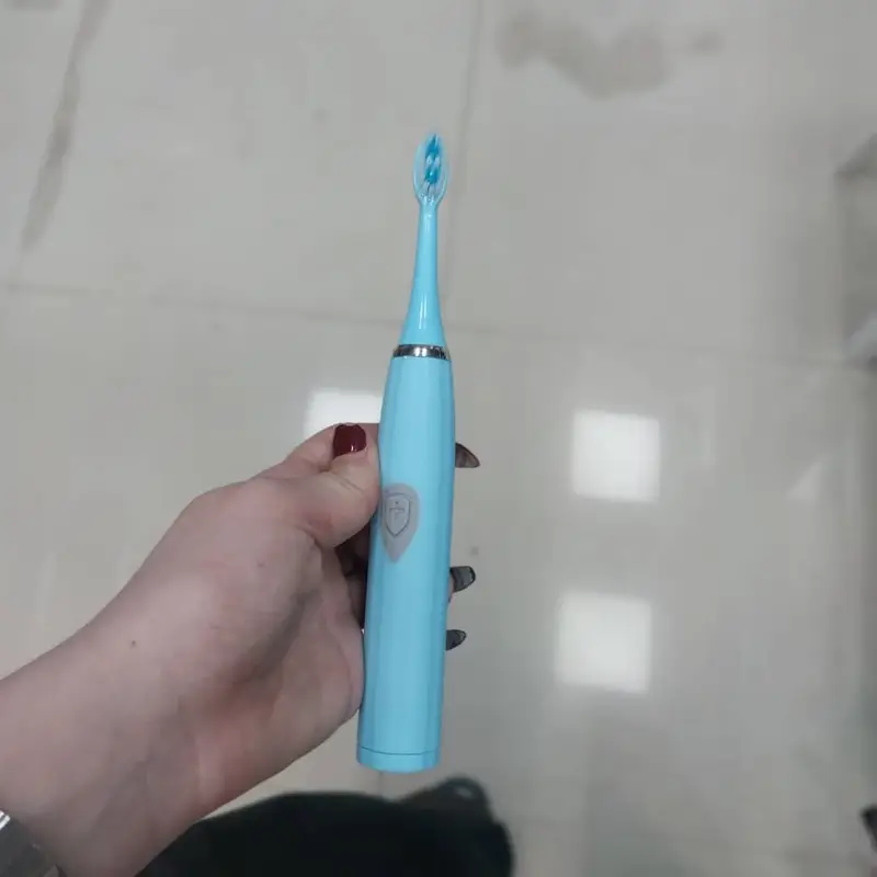 مسواک برقی شارژی صوتی IXYHKB – مناسب بزرگسالان و کودکان، رنگ آبی، دارای 5 حالت تمیزکننده، تایمر 2 دقیقه‌ای، 7 سری یدک